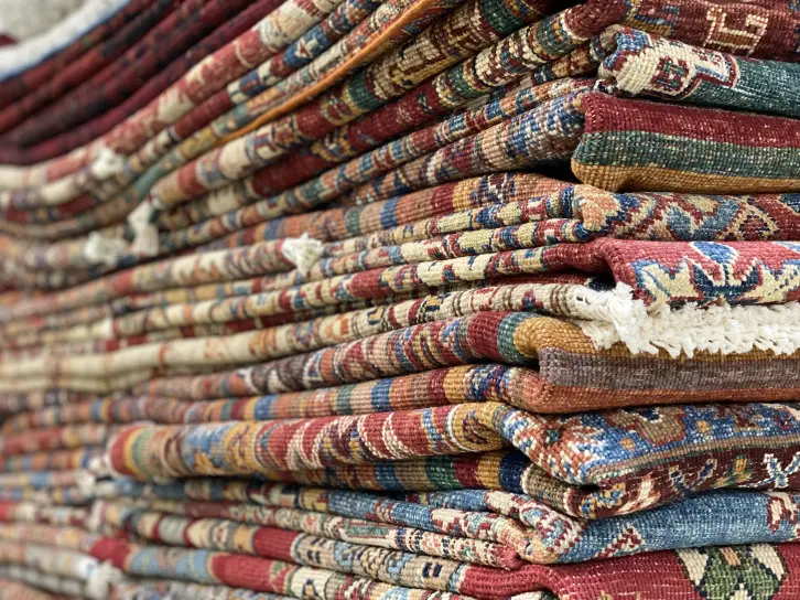 Was bedeutet Teppich-Ausverkauf?
